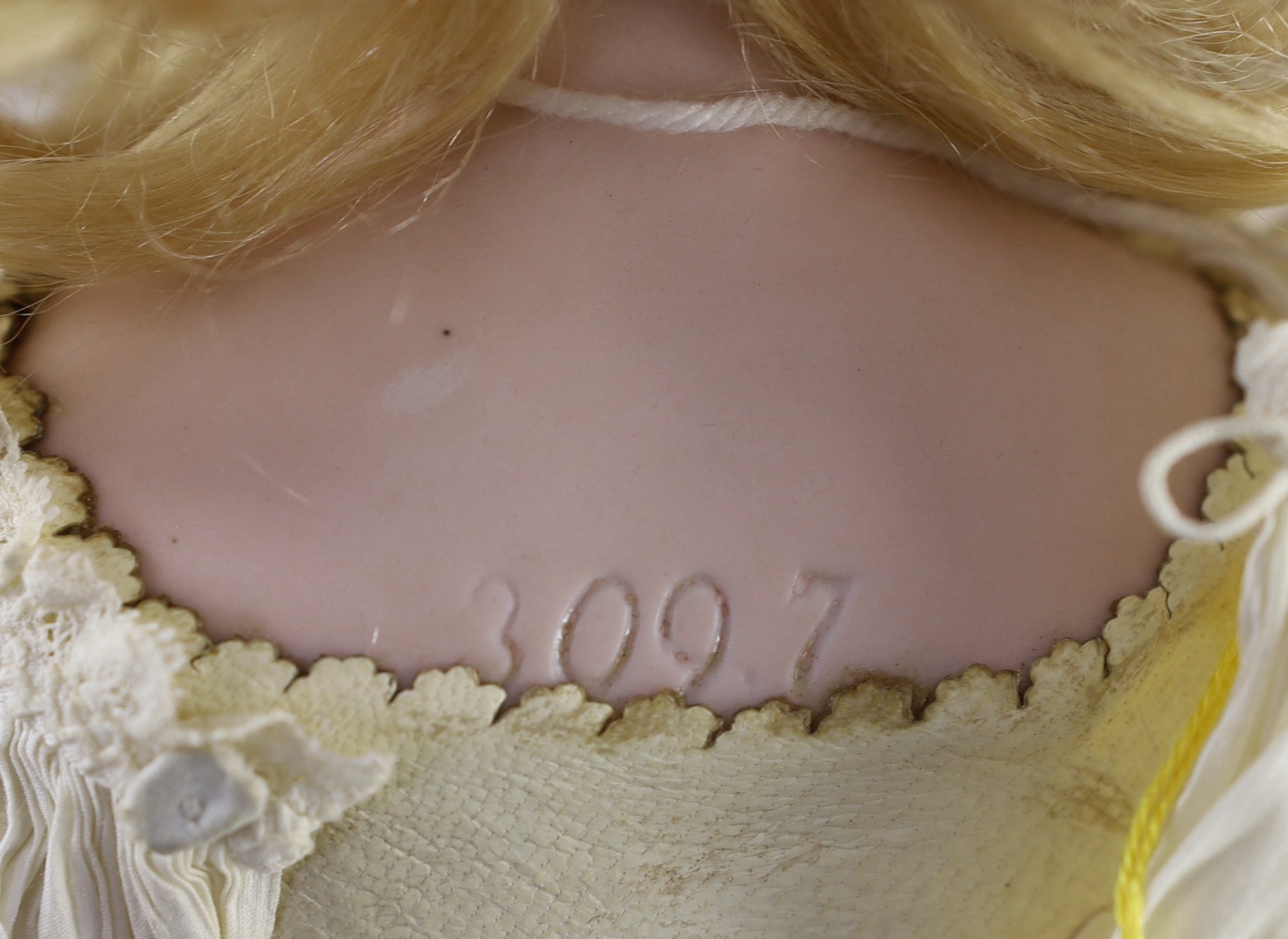 An Armand Marseille shoulder-bisque doll, German, circa 1896, 18in.